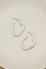 Irregular shape metal hoop earrings